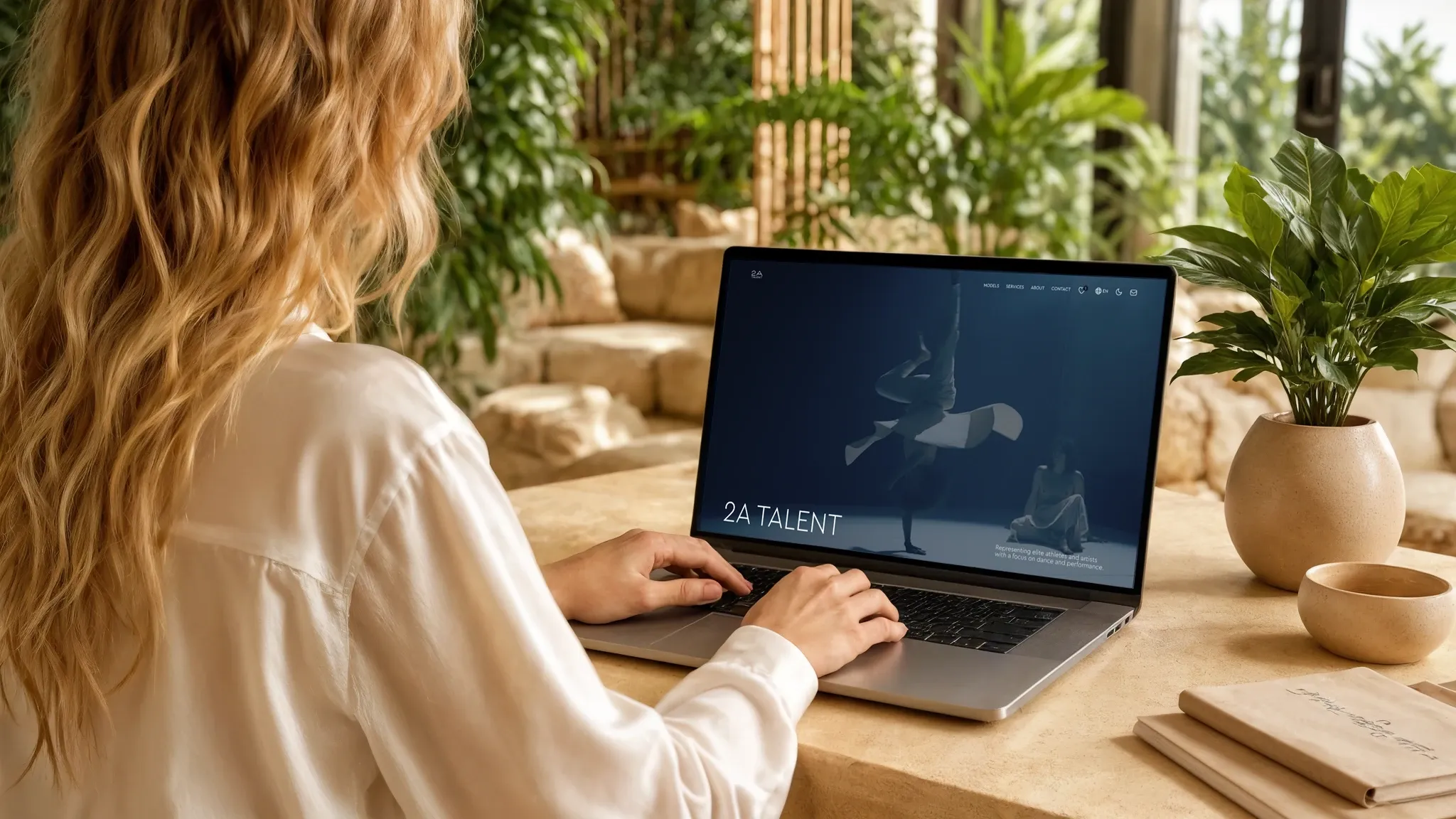 2A Talent homepage shown on a laptop